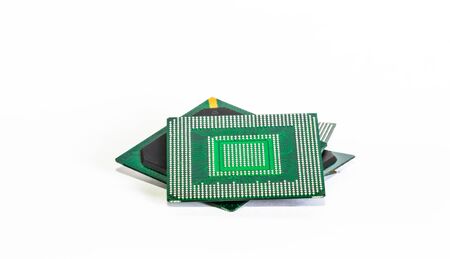 electronic chips isolated on white background. The chips are of different colors shapes and sizes.