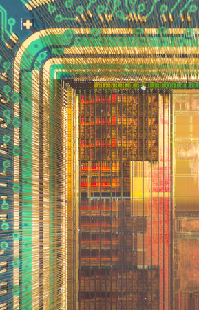 Open computer chip with gold wire connectionsの写真素材