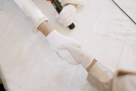 The marriage process in Indonesia, the bride and groom with the father as the guardian of marriage.の写真素材