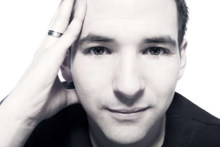 Young men in serious thinking poseの写真素材