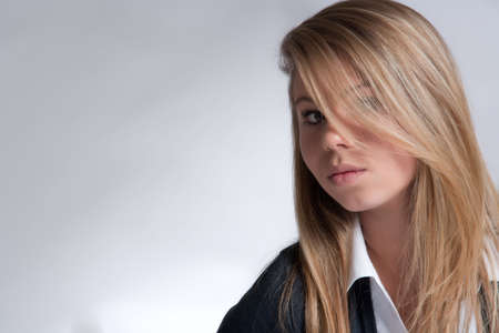 Portrait of a lovely girl in the studioの写真素材