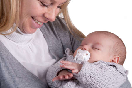 Happy family with their new daughterの写真素材