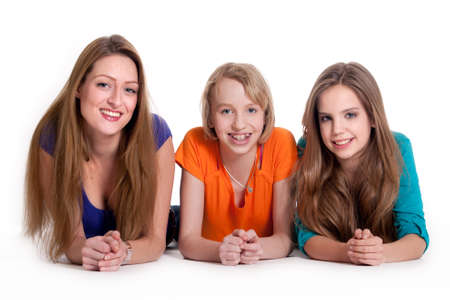 Mother and her kids on a white backgroundの写真素材