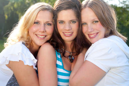 Girlfriends are having fun in the park
