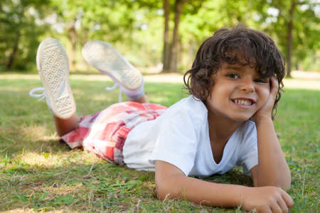 Happy caucasian boy having a nice day in the summerの写真素材