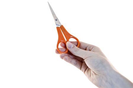 An isolated to white image of someone giving a pair of scissorsの写真素材