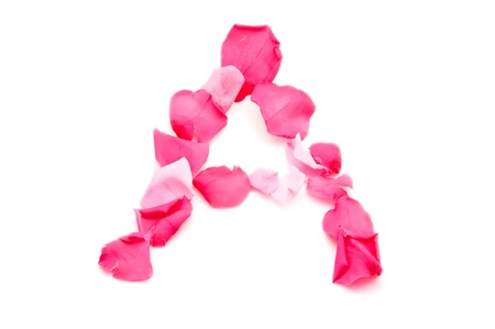 A pink letter "A" over a white background, made from beautiful pink petalsの写真素材