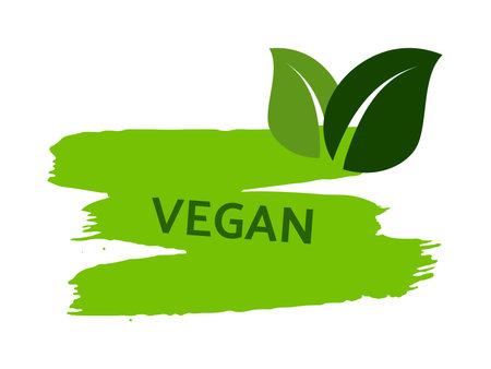 Green natural bio label. The inscription Vegan on green label on hand drawn stains. vector illustrationのイラスト素材