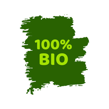 Green natural bio label. The inscription 100% Bio on green label on hand drawn stains. vector illustrationのイラスト素材