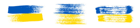 Ukrainian national flag in grunge style. Set of painted with a brush stroke flags of Ukraine. Vector illustrationのイラスト素材
