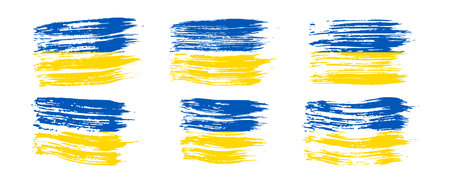 Ukrainian national flag in grunge style. Set of painted with a brush stroke flags of Ukraine. Vector illustrationのイラスト素材
