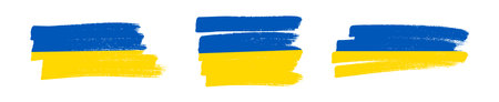 Ukrainian national flag in grunge style. Set of painted with a brush stroke flags of Ukraine. Vector illustrationのイラスト素材