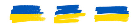 Ukrainian national flag in grunge style. Set of painted with a brush stroke flags of Ukraine. Vector illustrationのイラスト素材