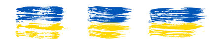 Ukrainian national flag in grunge style. Set of painted with a brush stroke flags of Ukraine. Vector illustrationのイラスト素材