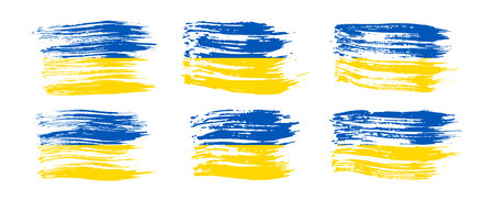 Ukrainian national flag in grunge style. Set of painted with a brush stroke flags of Ukraine. Vector illustrationのイラスト素材