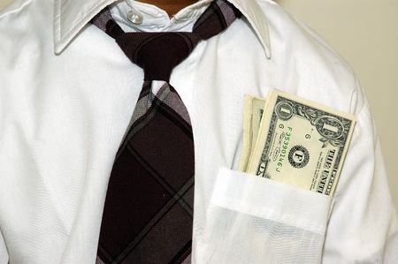 Money in the pocket after a hard day of workの写真素材