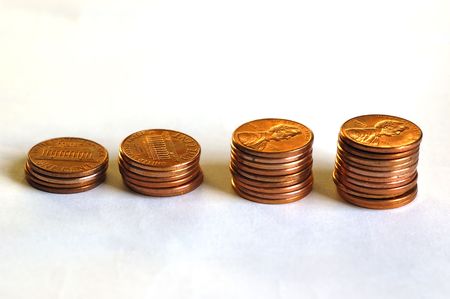A series of coins places in increasing height to signify growth