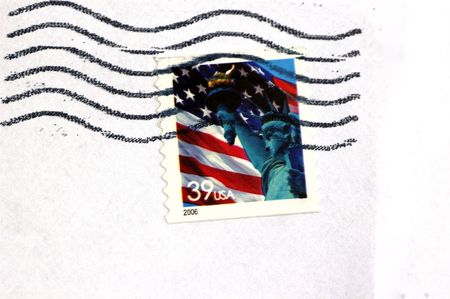 A US postage stap isolated on a white backgroundの写真素材