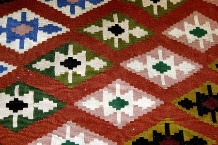 Close up shot a delicate pattern in a carpet