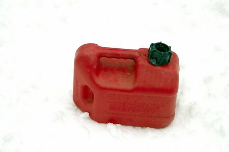 A Gasolene container isolated against a snow backgroundの写真素材