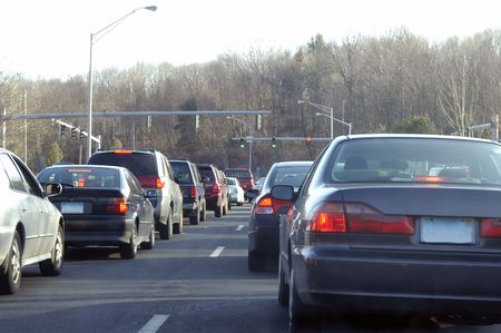 Lot of cars waiting at the red light