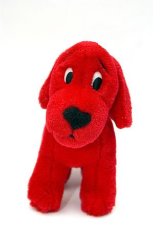 A Red puppy doll isolated on white back groundの写真素材