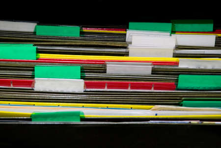 A set of organized file folders in an officeの写真素材