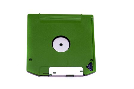 Green floppy disc isolated on a white back groundの写真素材