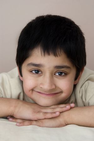 An handsome Indian kid dreaming about his futureの写真素材