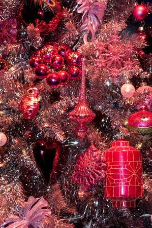 Close up details on a christmas tree with decorationsの写真素材