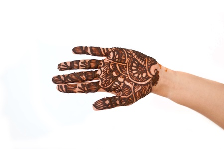 hands beautifully decorated with colorful herbsの写真素材