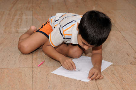 An Handsome Indian boy doing his artwork
の写真素材