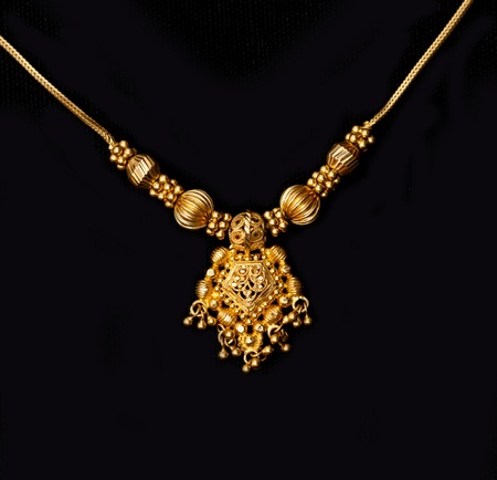 an authentic indian jewellery isolated on black backgroundの写真素材