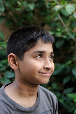 an handsome young indian man posing for the cameraの写真素材