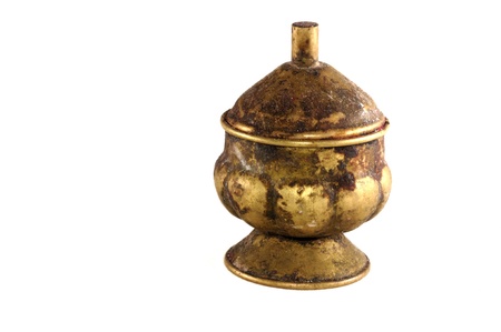 An antique indian metal vase isolated on white backgroundの写真素材