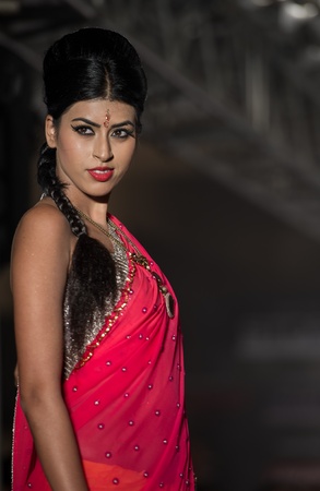 CHENNAI - JULY 21: A model walks on the ramp during the Chennai International Fashion Week runway on Jul 21, 2012 in Chennai , India.のeditorial素材