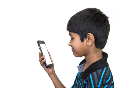 an handsome kid addicted to his cell phoneの写真素材