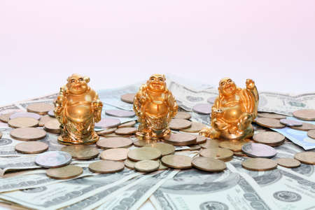 Buddha netsuke and money