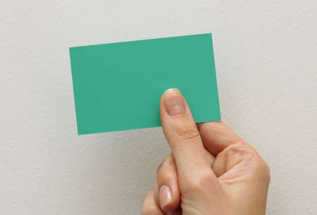 hand with a business cardの写真素材