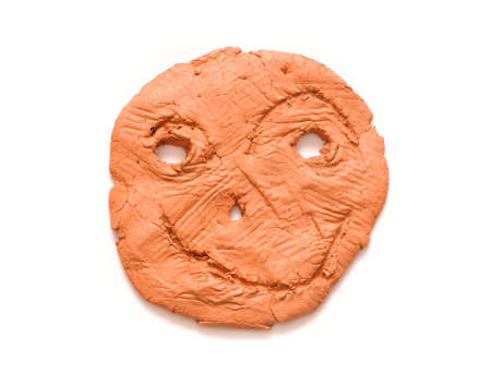 ceramic medallion, handmade, isolated on whiteの写真素材