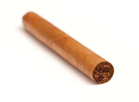 macro of cuban cigars in white background