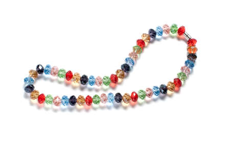 Necklace made of colorful beads isolated on whiteの写真素材
