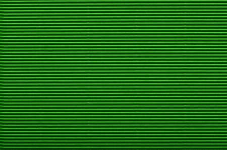 Texture of green corrugated paper for background usedの写真素材