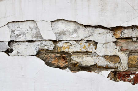Old painted brick wall fragment