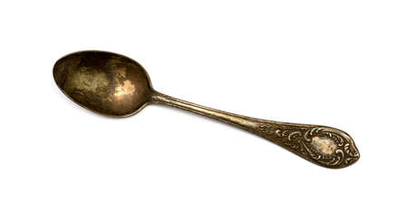 old antique spoon on a white backgroundの写真素材