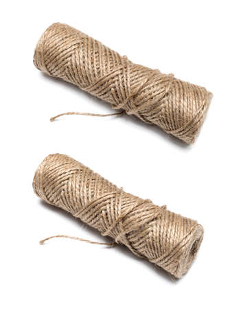 bobbin of the natural country thread isolated on white background