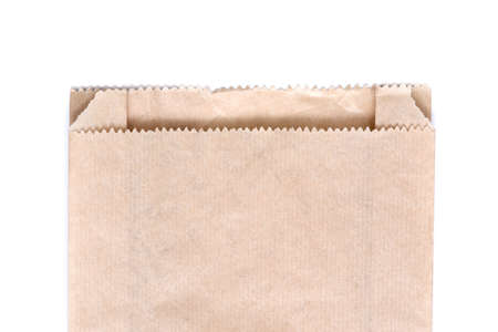 Brown paper bag isolated on whiteの写真素材