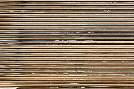 Stack of corrugated cardboard in a large pileの写真素材