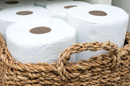 paper towel in a wicker basketの写真素材