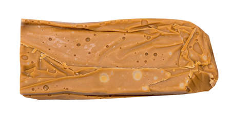 Sweet caramel candy on a white backgroundの写真素材